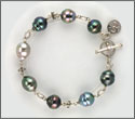 Bracelet fait main 11 perles cerclées 10 à 10,5mm cat A et B et argent (brpsx10032)