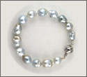 Bracelet fait main 14 perles baroques 9,75 à 11,35mm cat A et B et argent rhodié (brpsx10082)