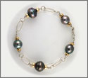 Bracelet fait main 5 perles cercles 10,35  12,4mm cat A et B or jaune 18 K et argent (brpsy10004) collier assorti copsy10019