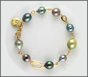 Bracelet fait main Jazz 9 perles semi-rondes semi-baroques et cerclées 8,6 mm à 11,35mm cat A B et or jaune 18K (brpyx10027)