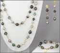 Parure JAZZ faite main : or jaune 18 K Collier : 51 perles Bracelet : 8 perles Boucles d'oreilles : 3 perles chacune